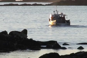 boat headed towards the horizon