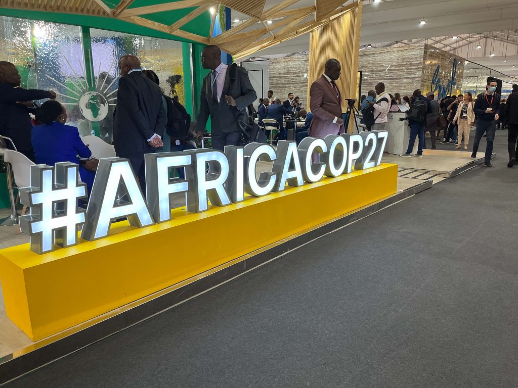 A display reading #AFRICACOP27