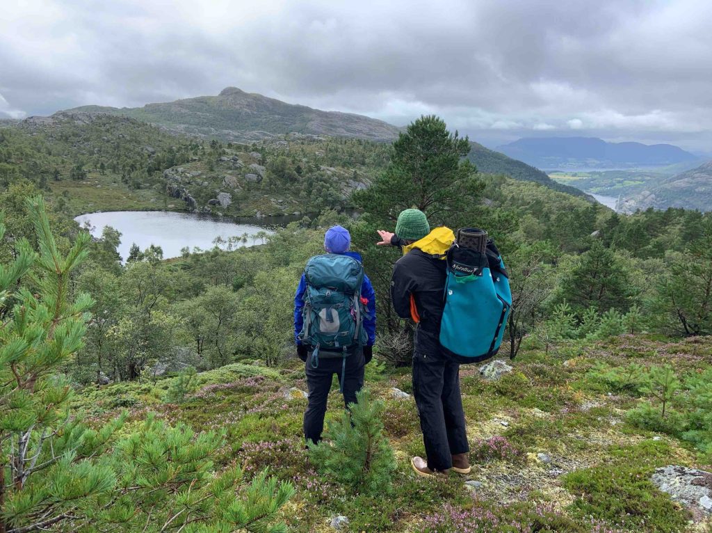 Field crew scouting glacial features.