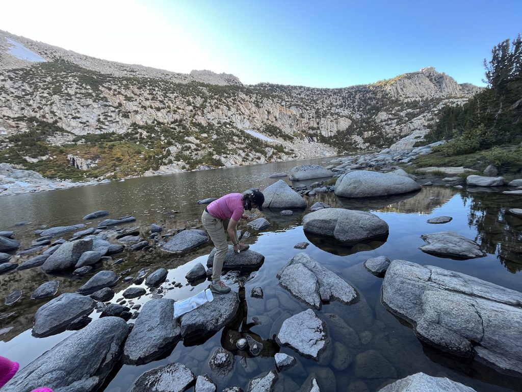 Meghan taking water sample from Baboon Lake.