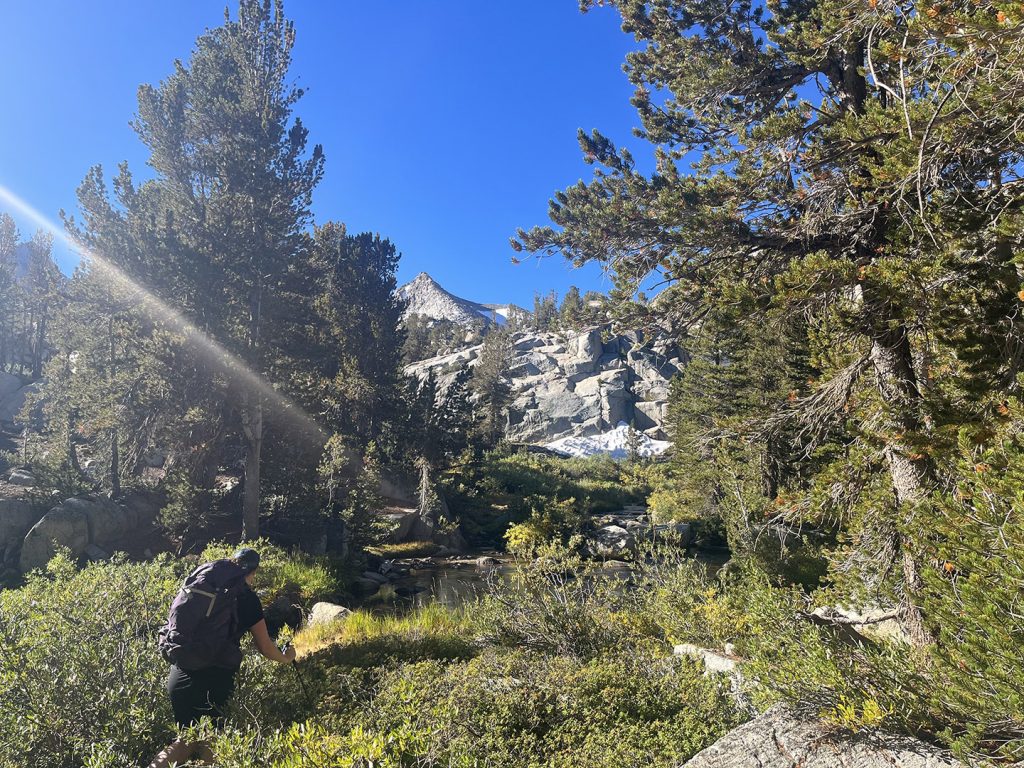 Crew backpacking to final sampling location at Baboon Lakes.