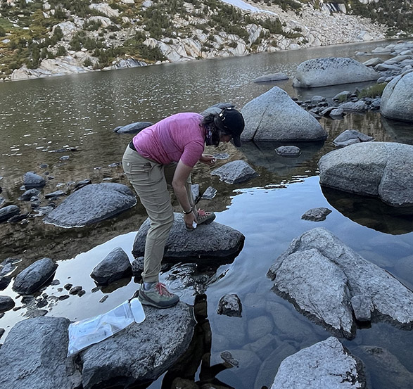 Meghan taking a water sample from Baboon Lake.