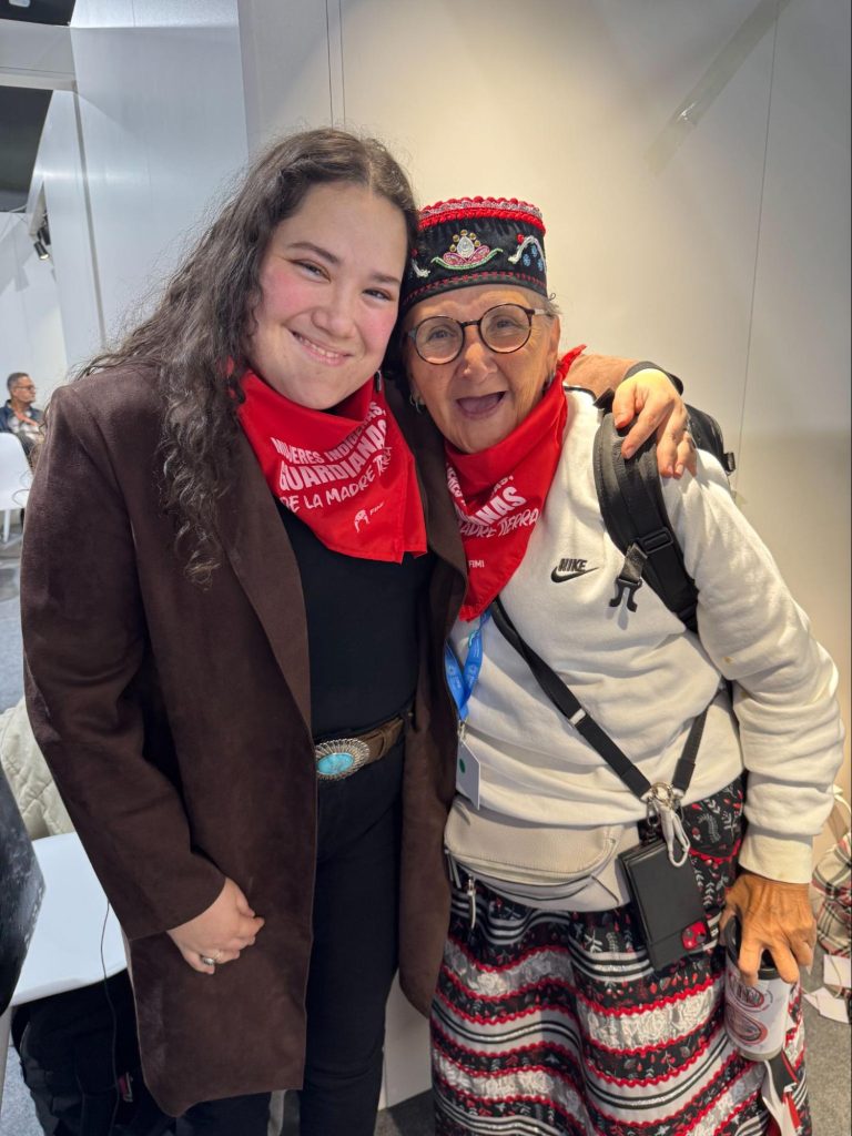 A photo of Holly Fain with Navajo (Minnesota Land of 10,000 Lakes) and elder Knowledge Keeper.
