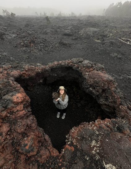 Photo of Hayley Beaudoin in volcanic setting.