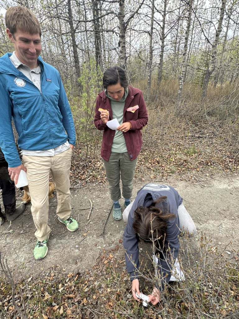 Field team participating in native species scavenger hunt.